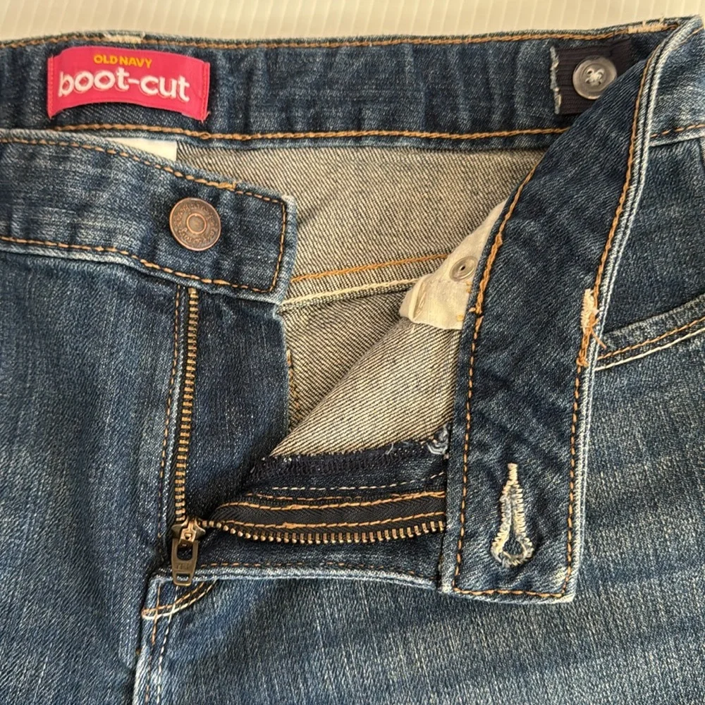 Old Navy bootcut blue jeans.  Girls size 12 plus